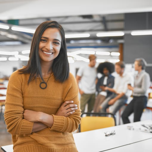 Women smiling while looking at the camera