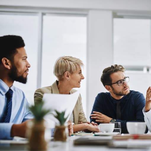 A group of people discussing.