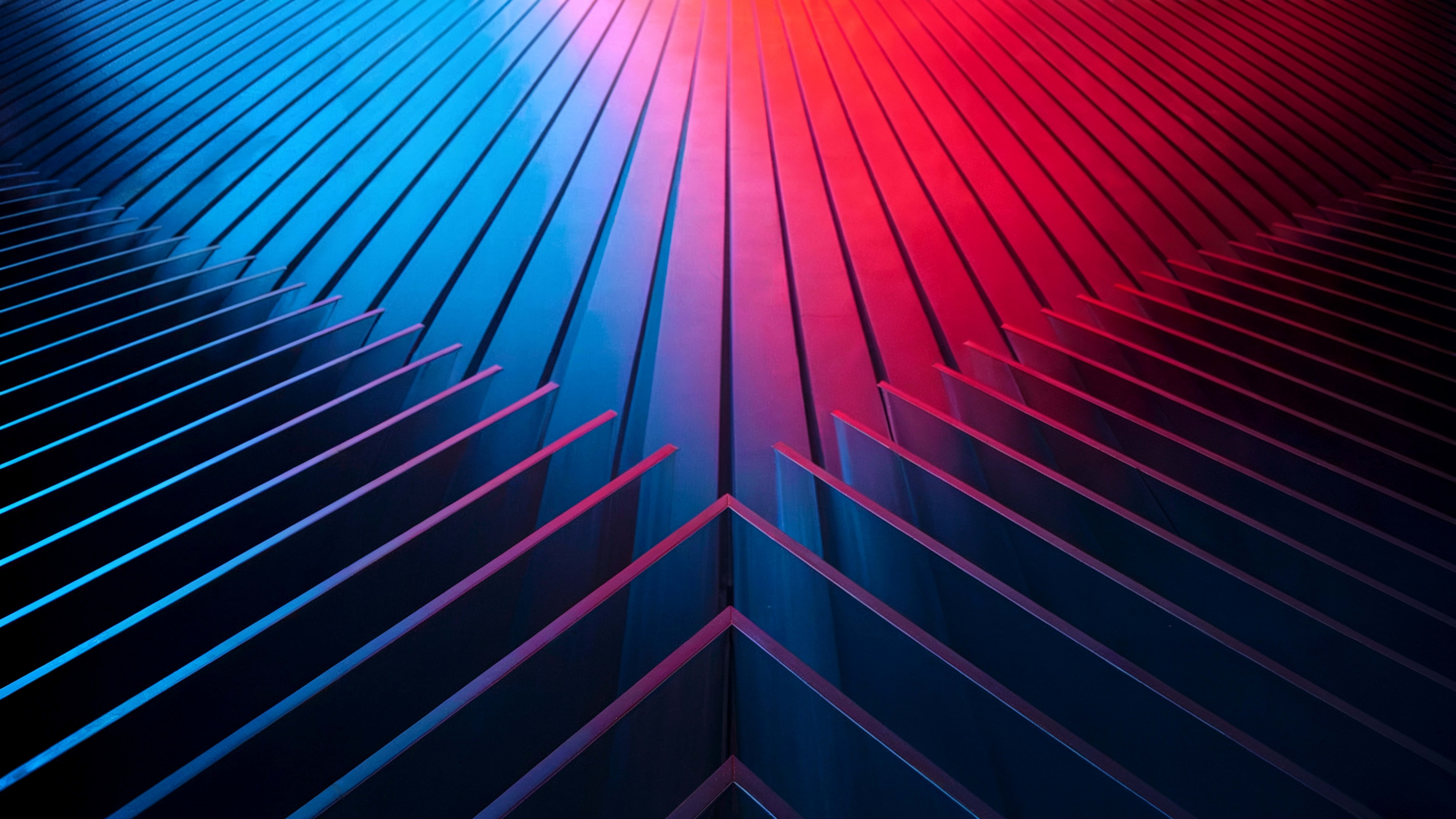 An abstract design showcasing a red and blue background with a prominent diagonal line cutting across.