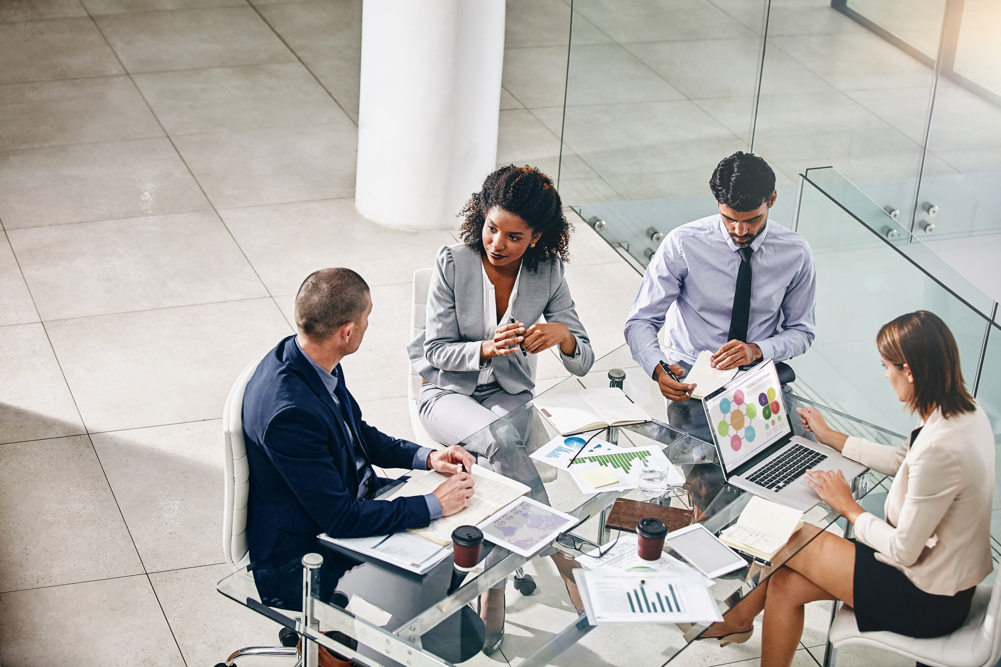 Business people and manager with laptop on desk for financial meeting, pitch or presentation.