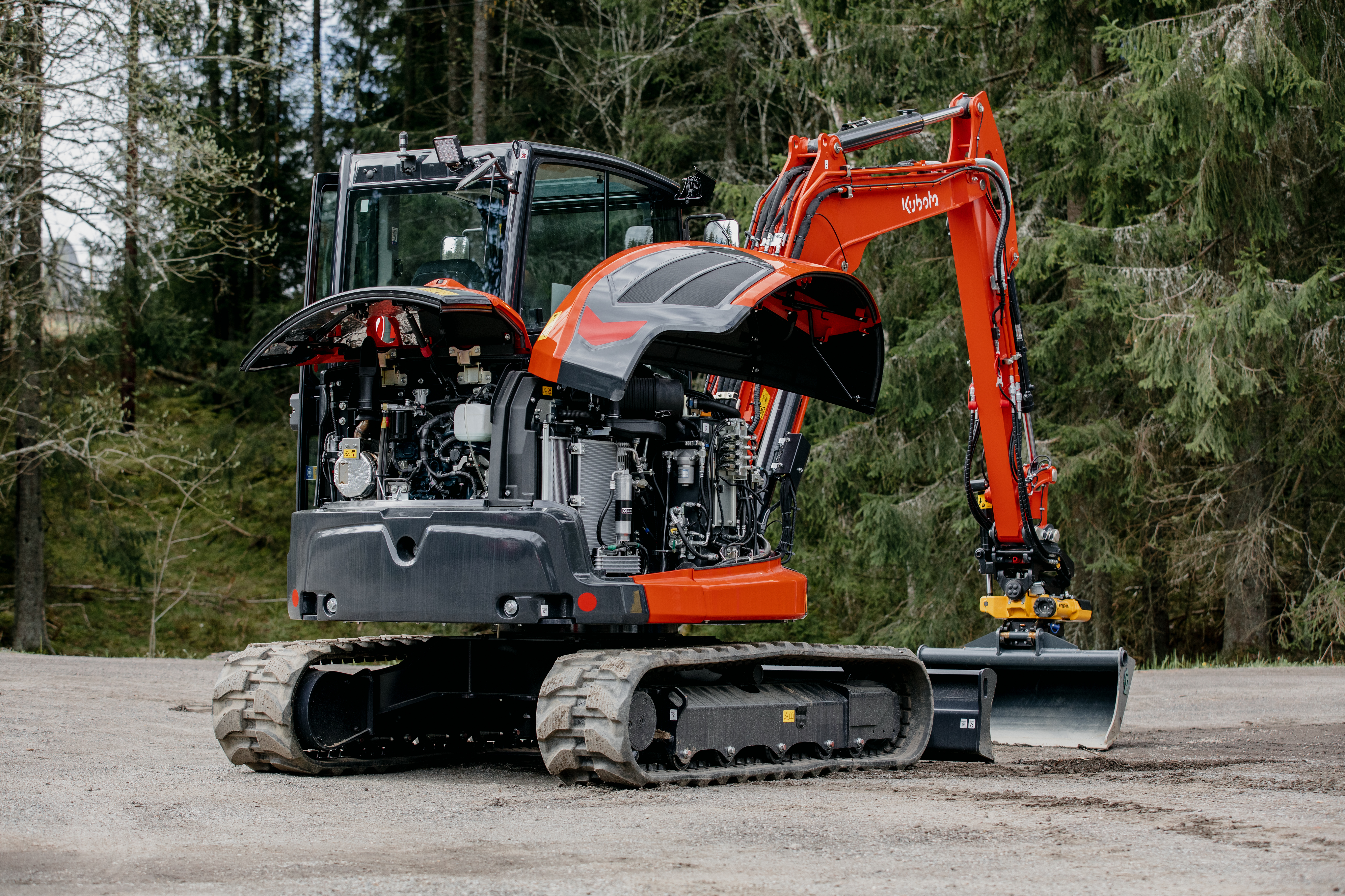 [Bilde av Kubota Gravemaskin i arbeid]