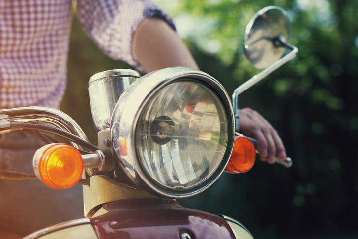 bigstock-Young-Man-Riding-Old-Retro-Sco-66432961.jpg