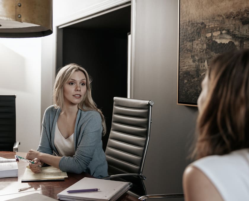 Allison Bennett at desk