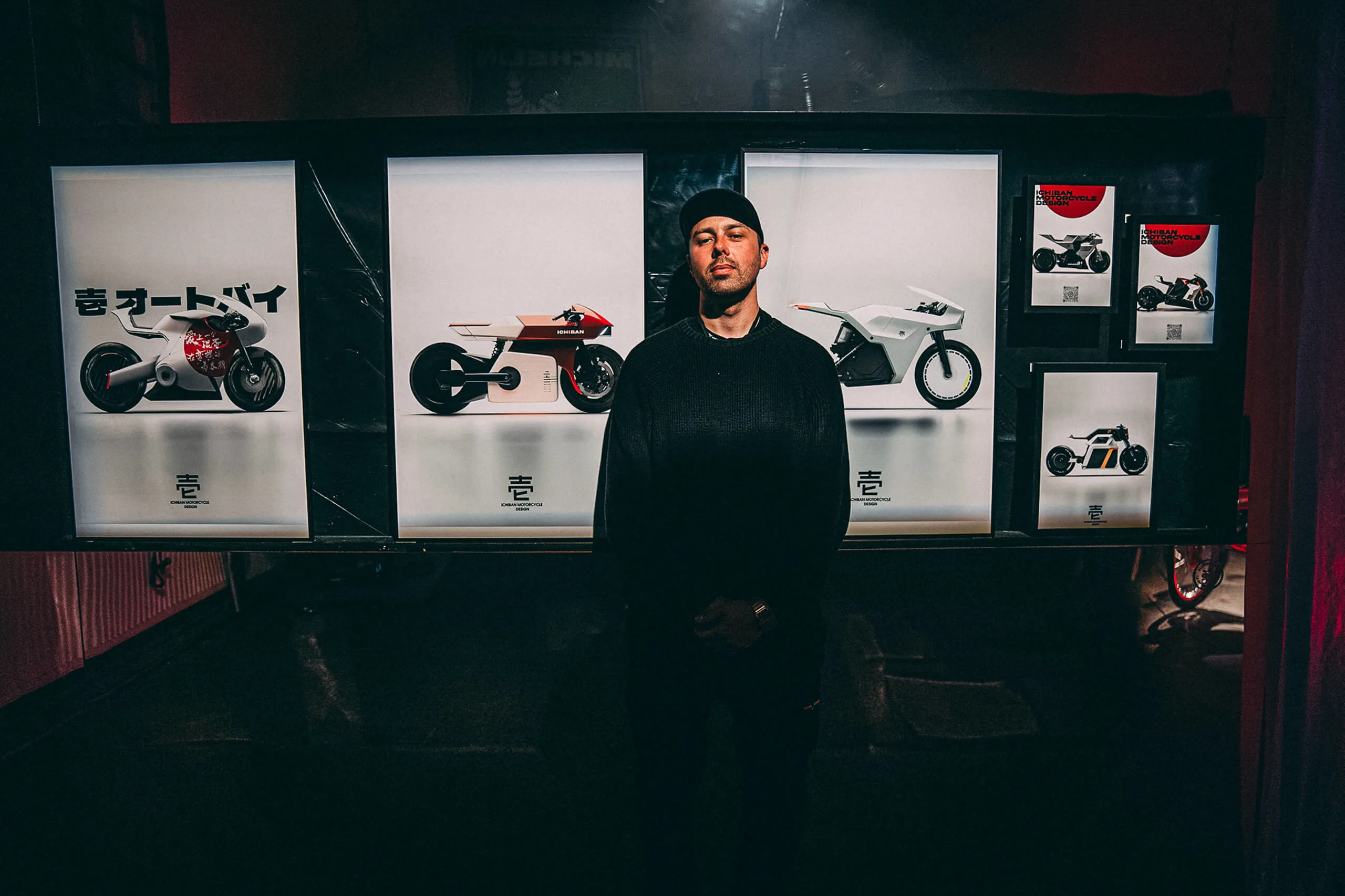A designer standing ahead of ichiban moto sketches
