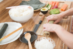 NYC - rolling sushi by hand Shot