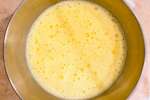 whisking eggs to make a spanish omelet or spanish tortilla | Classpop Shot