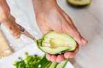 person scooping avocado | Classpop Shot