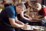 a group enjoying a pottery class Shot