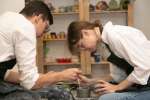 couple doing pottery together Shot