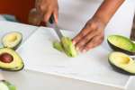 Baltimore - 3 chef slicing avocados for homemade guacamole copy Shot