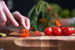 Cutting tomatoes Shot