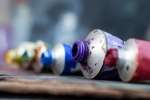 Portland - a woman enjoying a painting glass workshop Shot