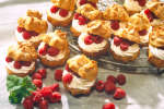 Cream puffs with fresh raspberries Shot