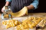 Using pasta machine for pasta making Shot