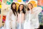 NYC - a group of women smiling and posing in a painting class Shot