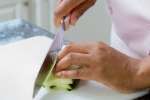 chef slicing a fresh cucumber | Classpop Shot