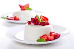 Goat Cheese Panna Cotta With seasonal berries and edible flowers | Classpop Shot