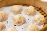 Soup dumplings in a bamboo steam basket | Classpop Shot