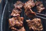 Grilling BBQ short ribs in homemade kalbi marinade | Classpop Shot