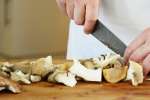 Houston - chef slicing mushrooms for ravioli Shot