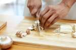 chef slicing wild mushrooms | Classpop Shot