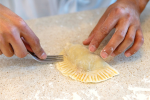 Chef folding empanadas | Classpop Shot