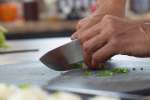 chef slicing chives with a knife | Classpop Shot