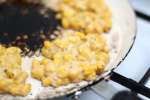 Frying corn fritters | Classpop Shot