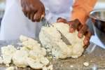 Chef cutting up cauliflower head | Classpop Shot