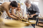 San Francisco - three people molding clay Shot