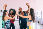 Denver - group of friends salsa dancing together Shot