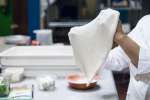 chef handling fresh pizza dough | Classpop Shot