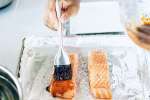 chef glazing salmon fillets | Classpop Shot