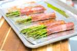 prosciutto wrapped asparagus on a tray | Classpop Shot