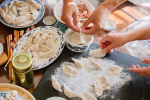 Las Vegas - group making dumplings Shot