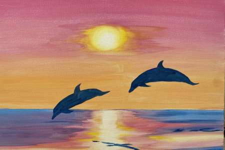 Sunset Dolphins in Motion