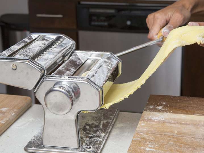 chef rolling out pasta dough | Classpop Shot