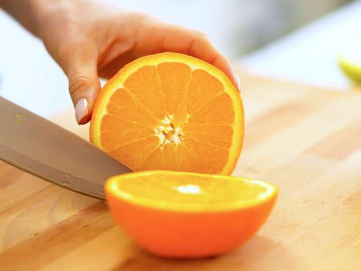person slicing an orange | Classpop Shot