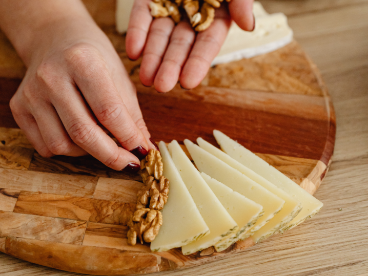 manchego cheese on wood board Shot