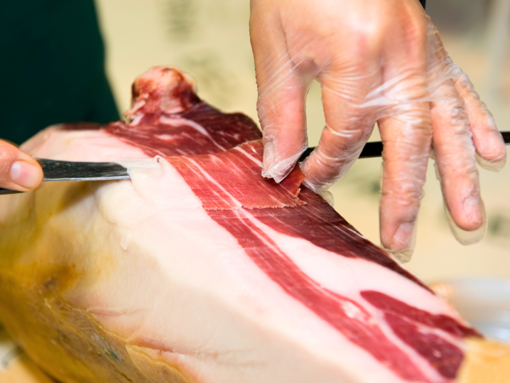 cutting serrano ham Shot