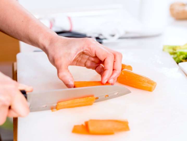 person slicing carrots | Classpop Shot