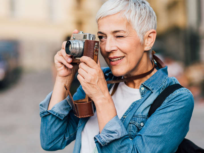 NYC - Woman taking pictures outside Shot