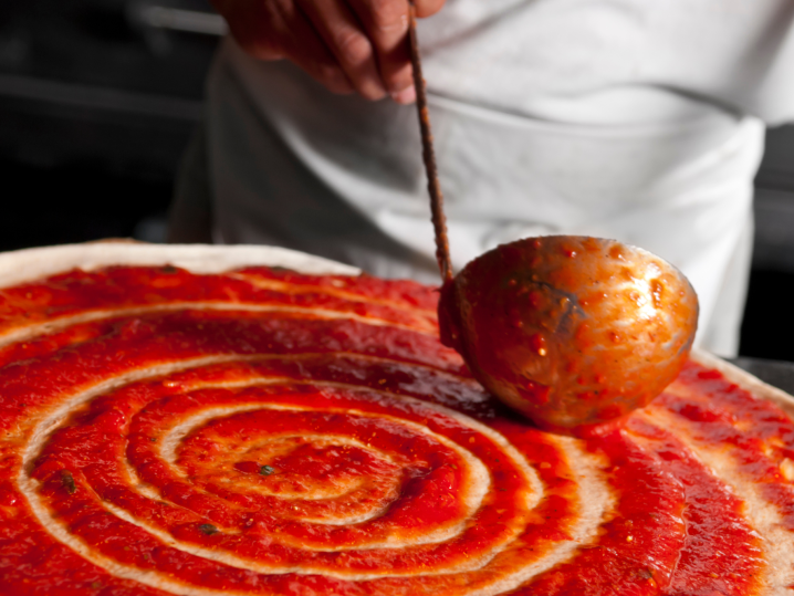 Edmonton - tomato sauce on pizza dough Shot