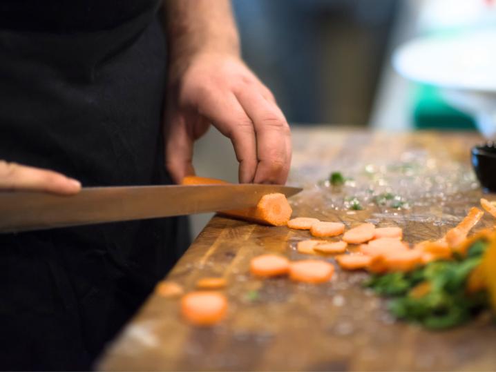 Charlotte - cutting carrots Shot