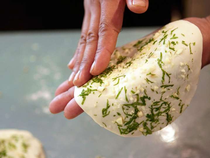 Making fresh naan bread Shot