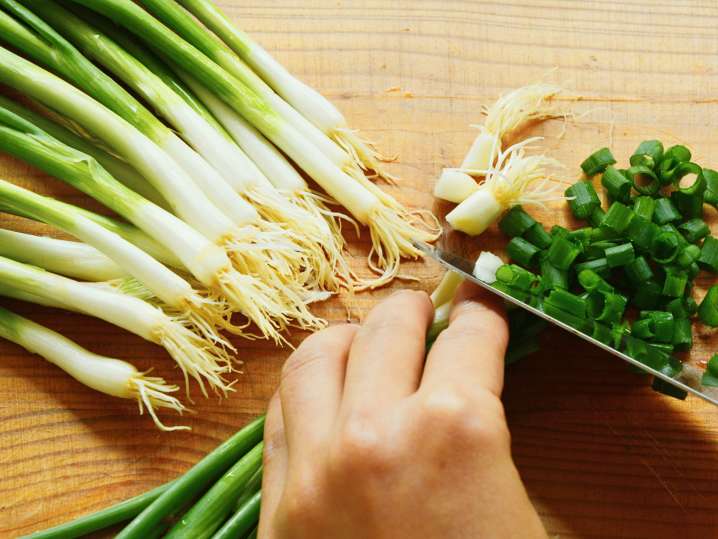 Slicing spring onions Shot