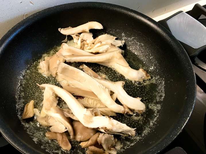 Frying king oyster mushrooms Shot