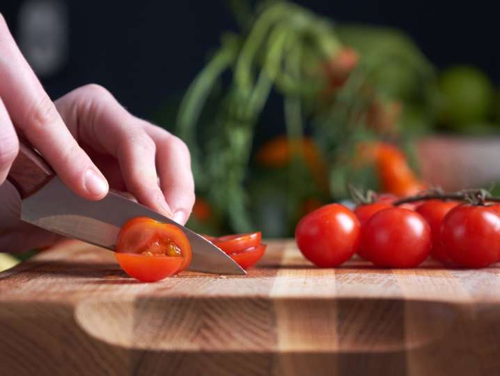 Cutting tomatoes Shot