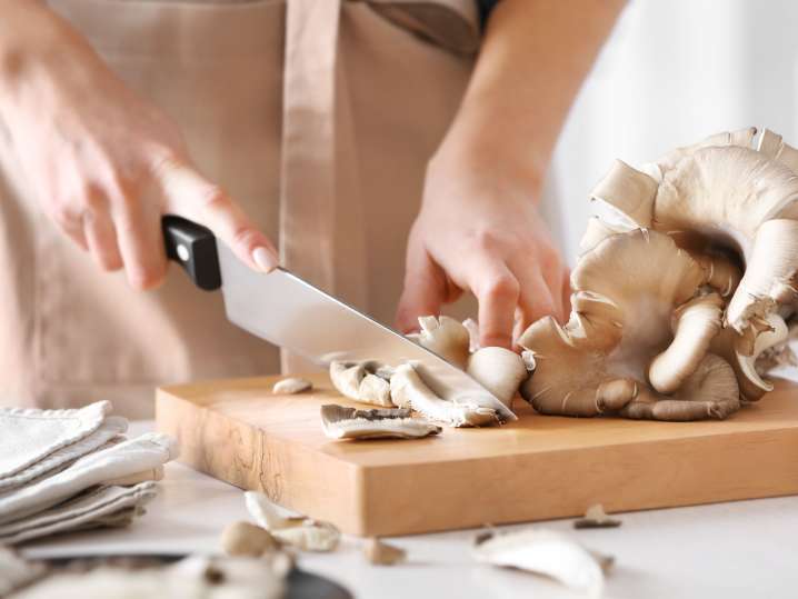 Cutting mushrooms Shot