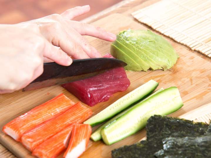 Cutting ingredients for sushi Shot